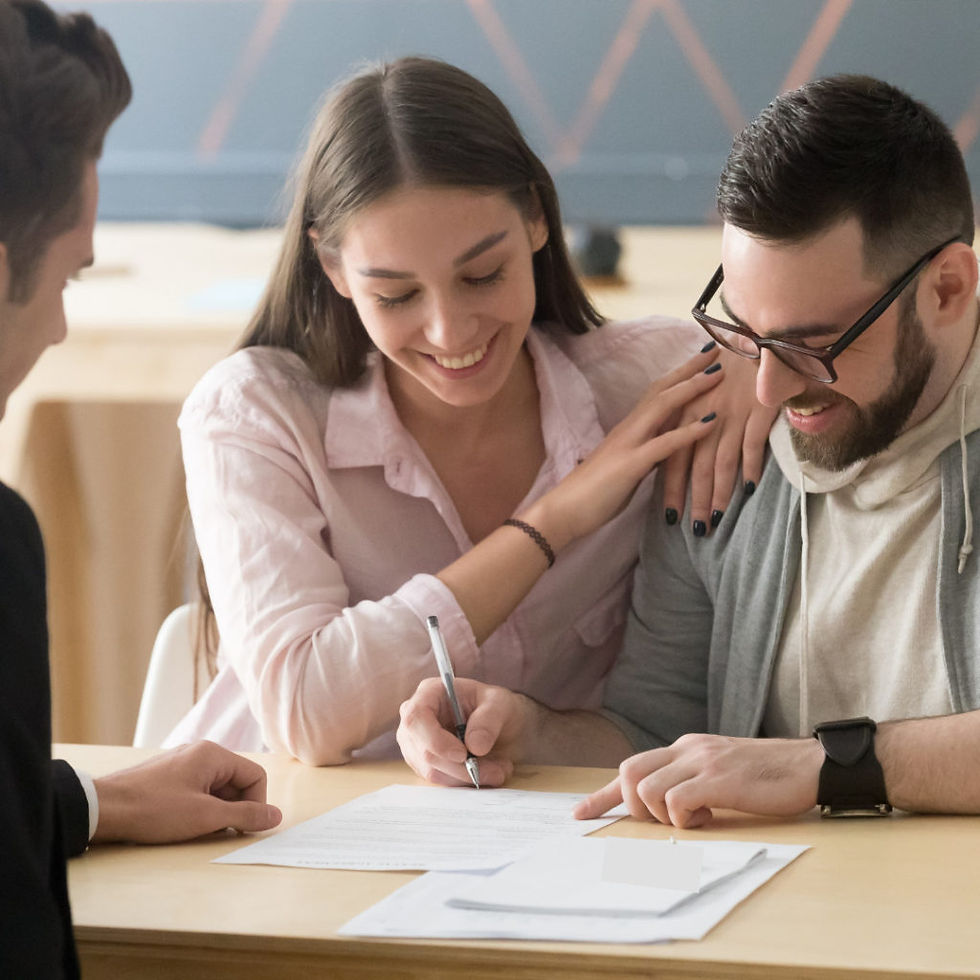 Couple signing a contract