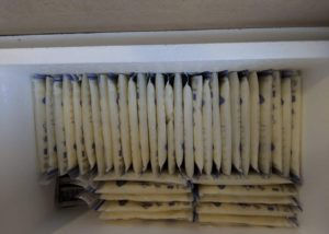 frozen breast milk packs in freezer