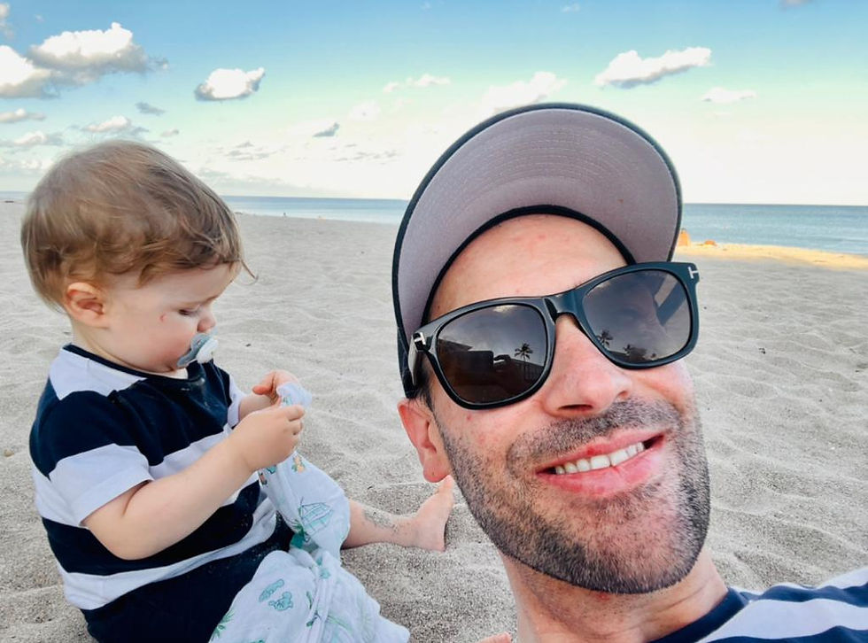 Dad and baby at the beach