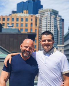 father and son posing