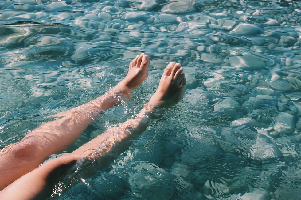 close up up legs in a stream