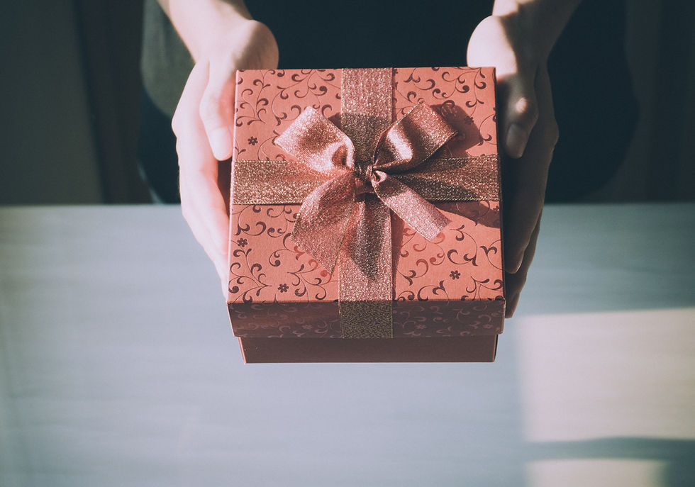 close up of gift box being held