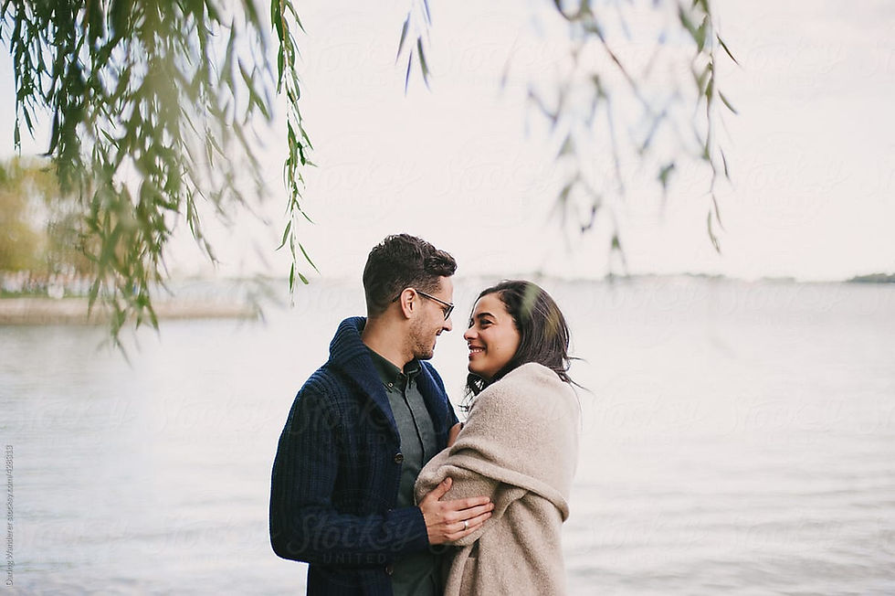 Intended parents with surrogate at the beach