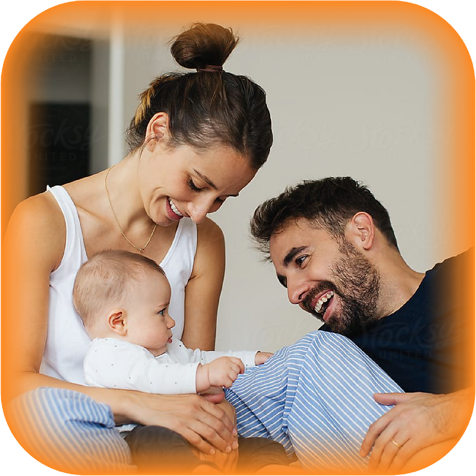 Happy parents bonding with their baby
