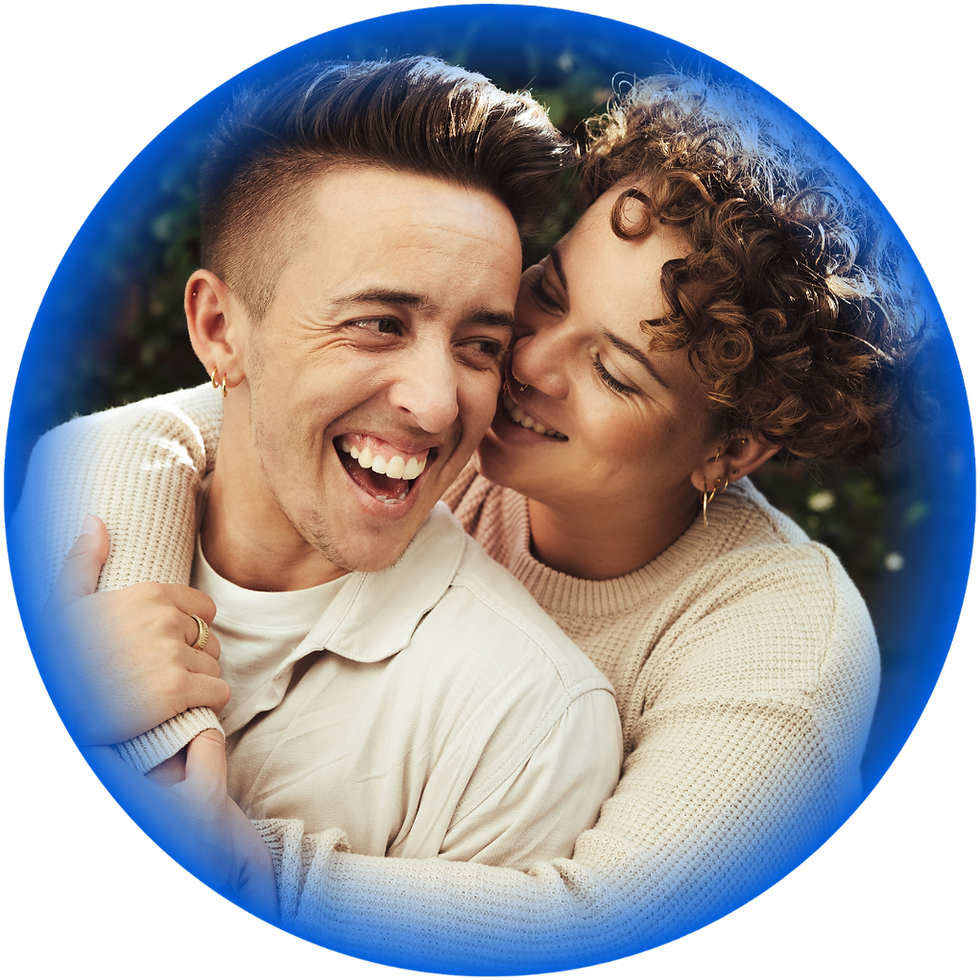 Happy couple embracing outdoors