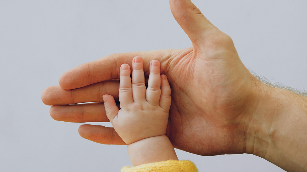 man holding baby